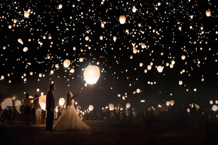 nighttime wedding lantern release